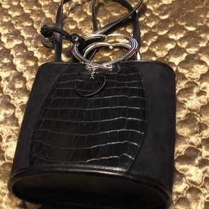 Black faux leather cross body with hear shaped metal  handles